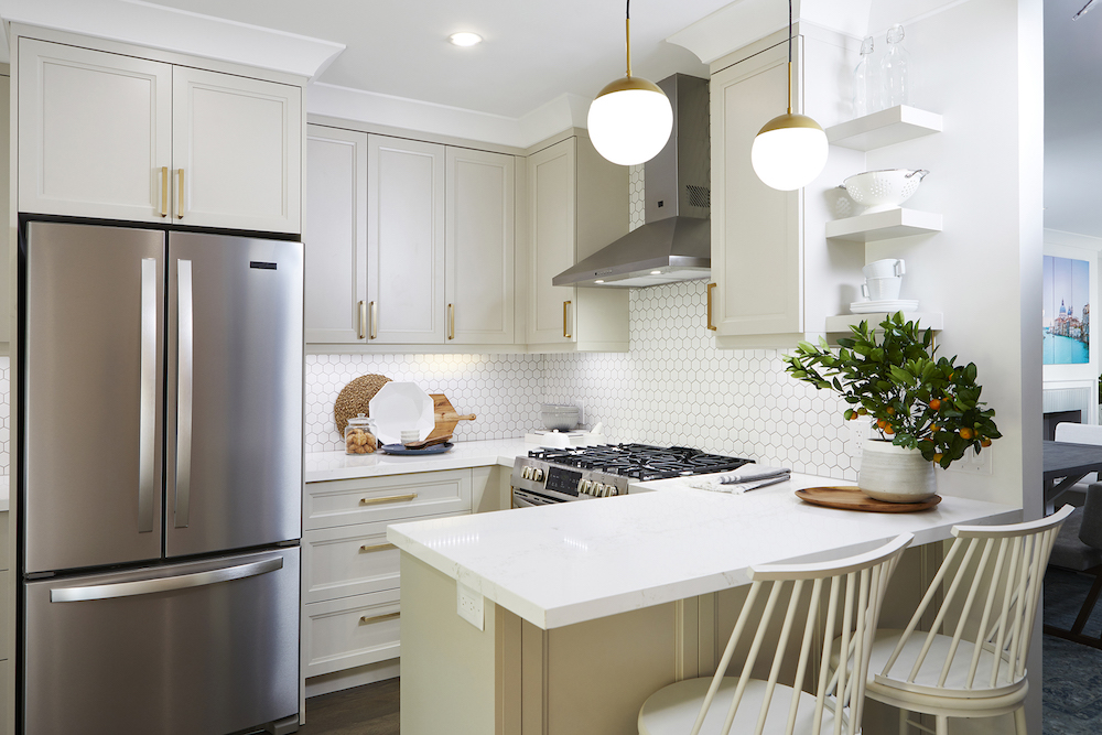 modern white kitchen with stainless steel appliances