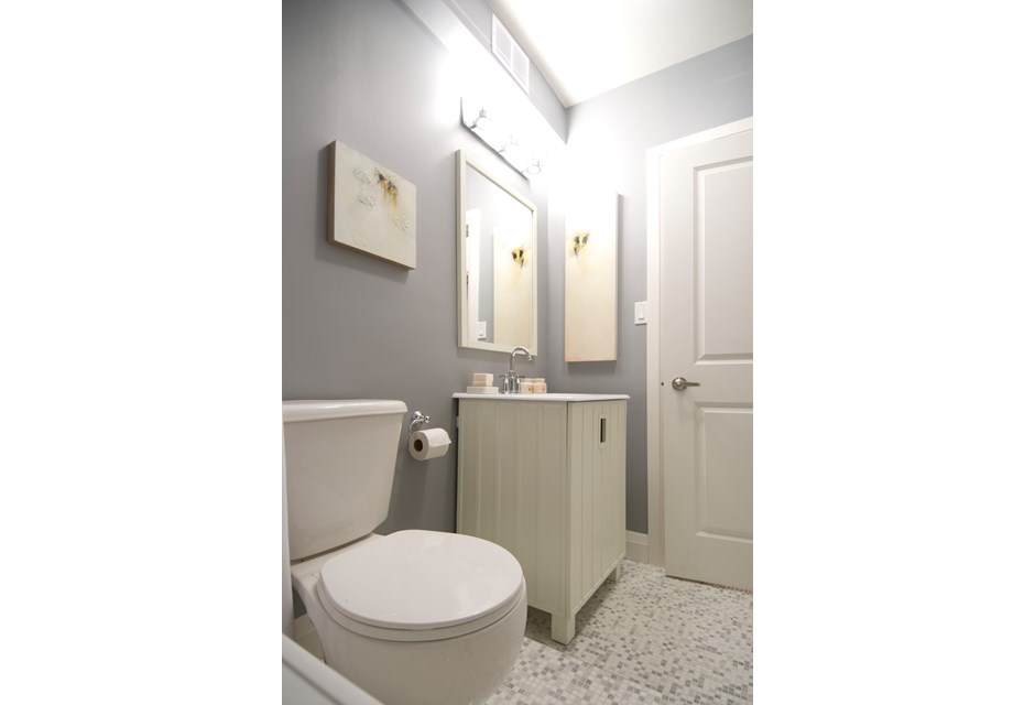 White bathroom with tiny mosaic tiles