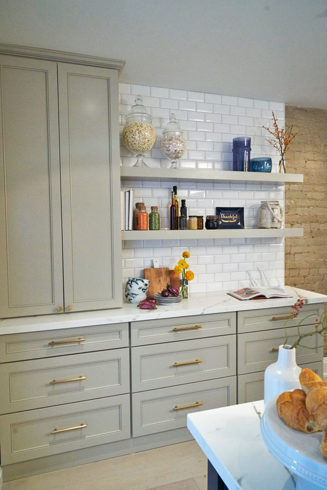 Bevelled-edge subway tile has three-dimensional allure in this modern kitchen.