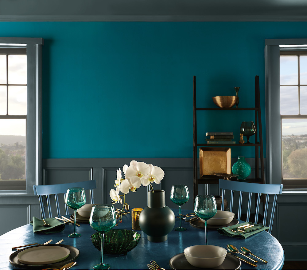 Stylish dining room with its walls painted in BEHR’s Antigua M460-7 interior paint colour