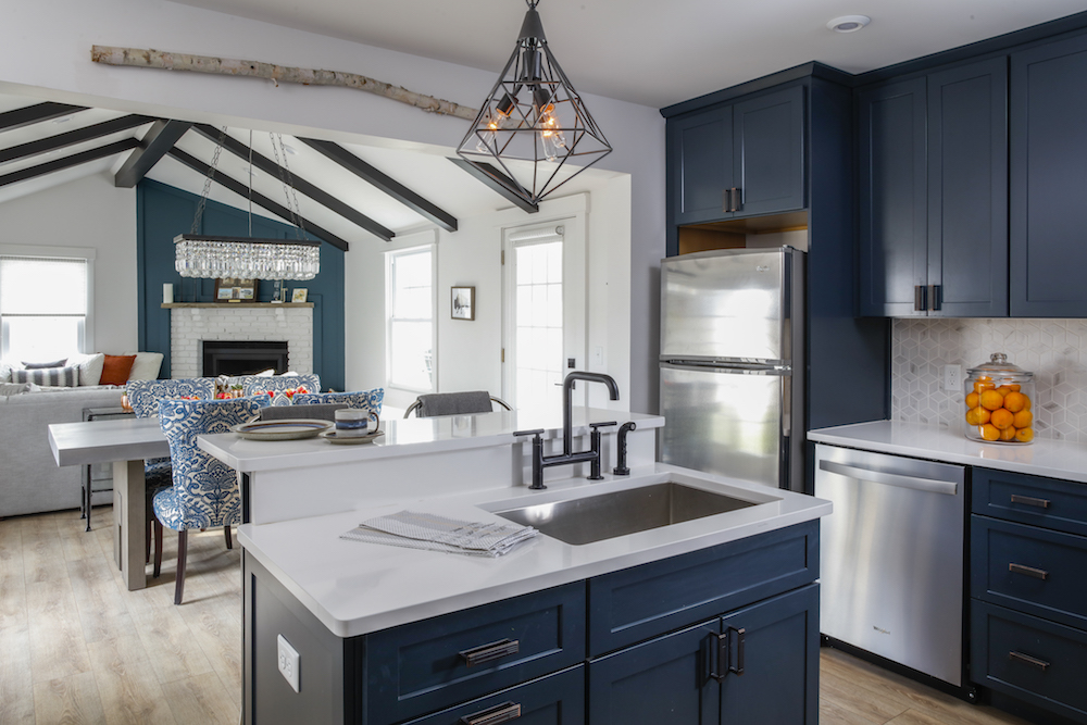 Buyers Bootcamp Cape Cod navy kitchen cabinets and white quartz countertop