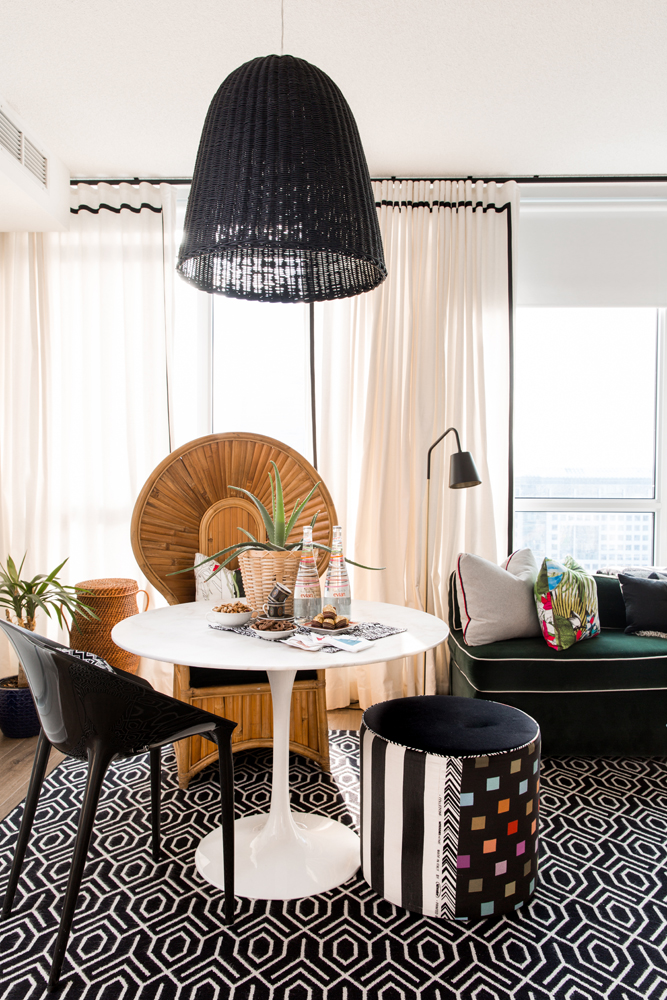dining area with black woven pendant light