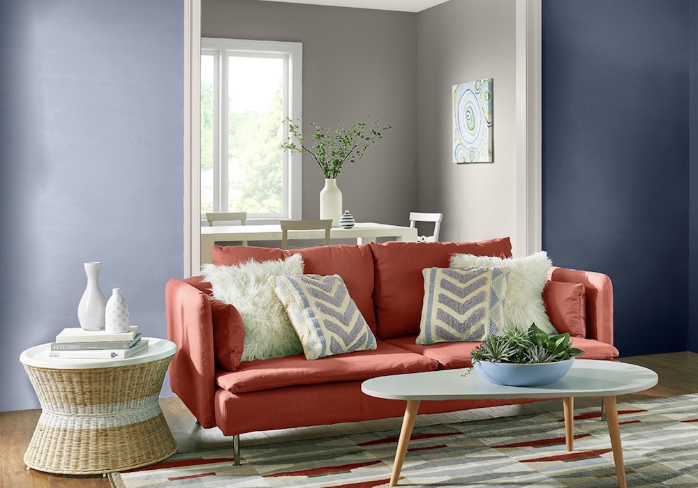 Chic living room with a red couch, mid-century modern painted coffee table, and BERH Extreme S530-6, Polar Bear 75 + Fashion Gray PPU18-15 on the walls