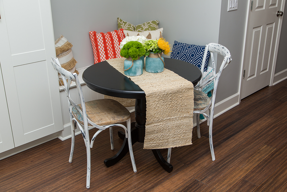 Breakfast nook with white bistro chairs