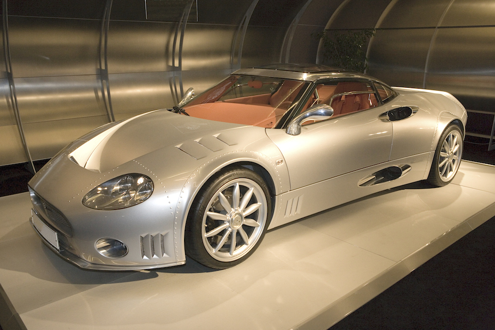 Sleek silver sports car in private garage