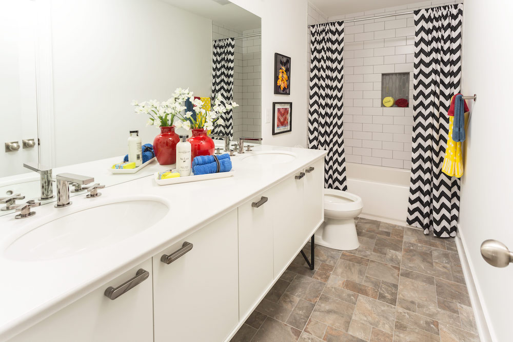 Masters of Flip primary colour renovation main bathroom with chevron shower curtain
