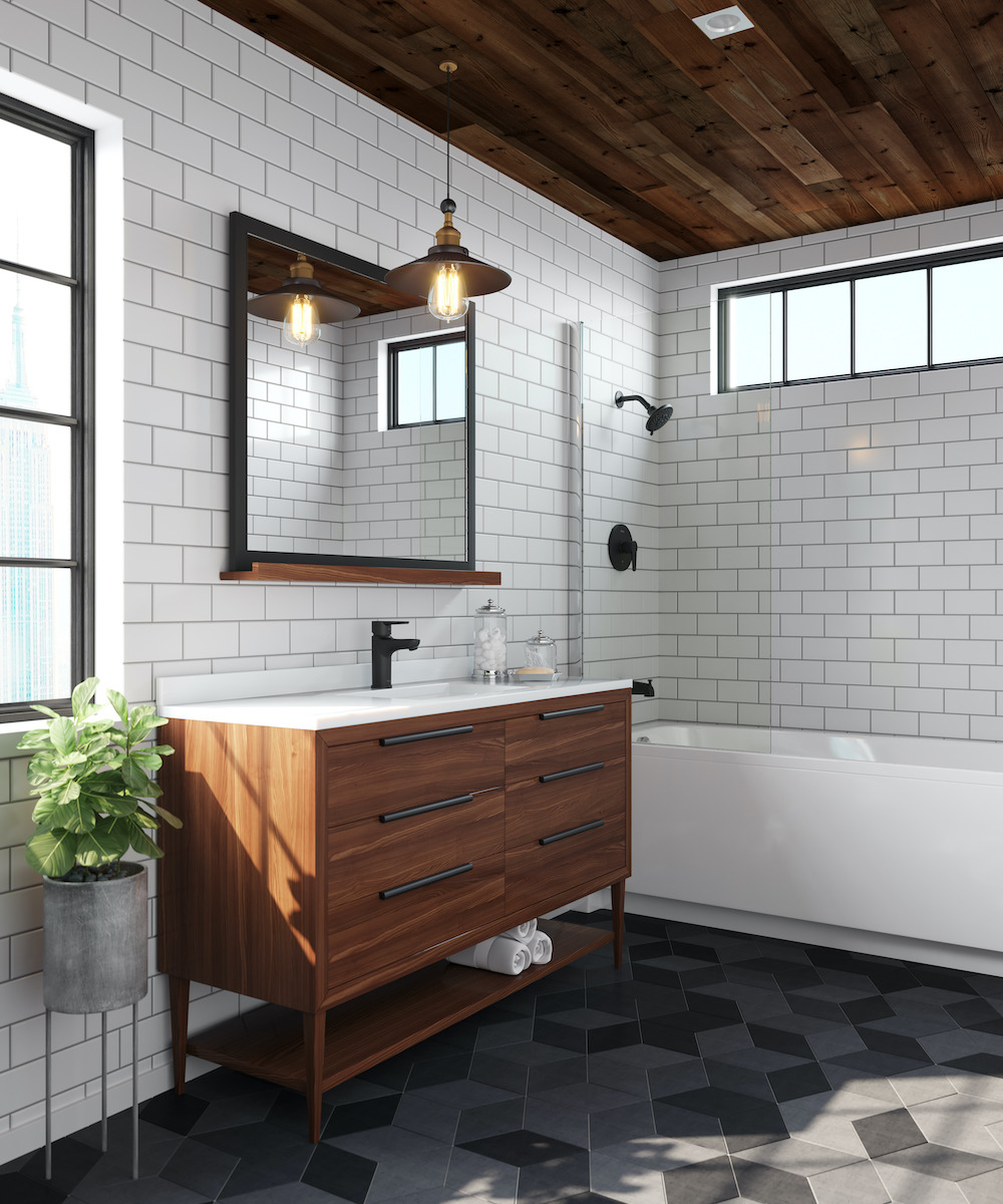Chic bathroom with grey diamond-shaped tile floors, a wooden dresser vanity, wooden ceiling, a shower bathtub combo with white subway tile and grey grout with a horizontal window, black fixtures, a dark copper pendant lamp over the vanity, a large black framed mirror, and a potted plant on a stand