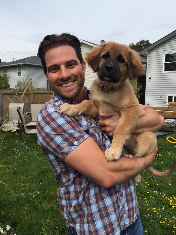 Scott McGillivray holding cute puppy