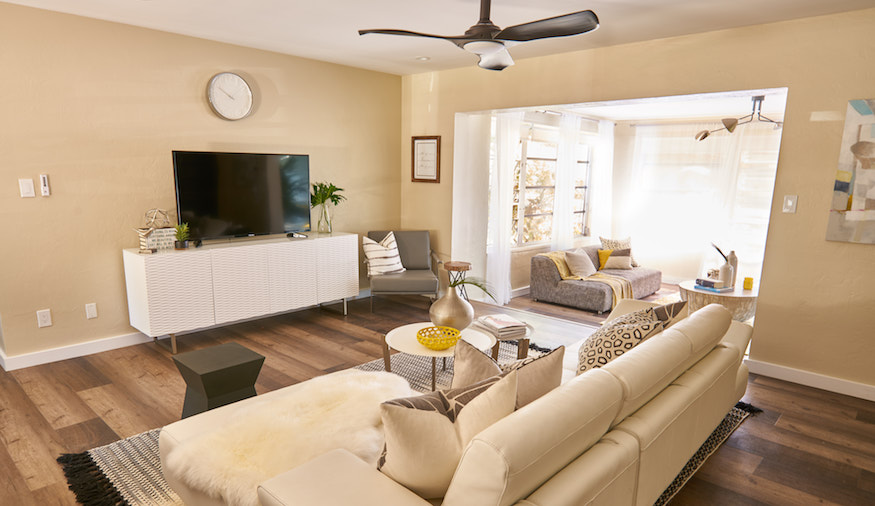 Newly renovated living room on buyers bootcamp is a perfect place to curl up and watch some TV