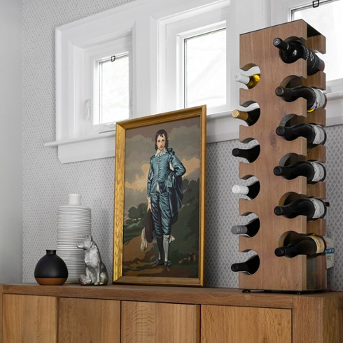 Wine bottle lined up in a wooden unit