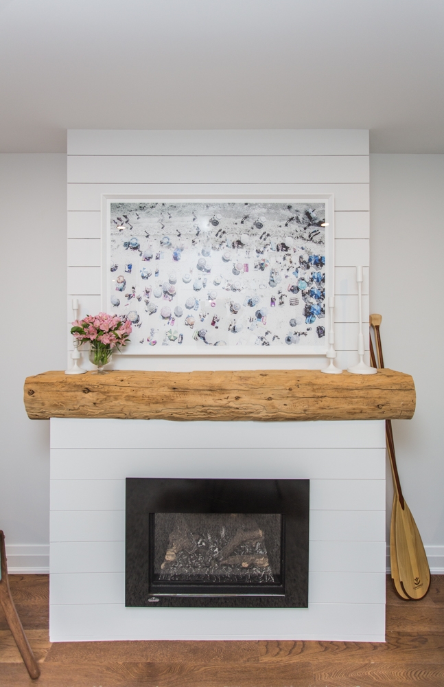 Going the extra mile to make this house feel like home, Bryan refinished a reclaimed barn beam from the clients’ family farm and fashioned it into a rustic mantel.