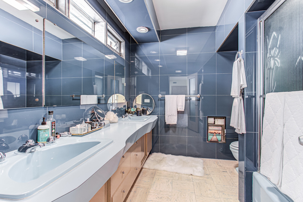 Retro bathroom with blue-grey glass tiles