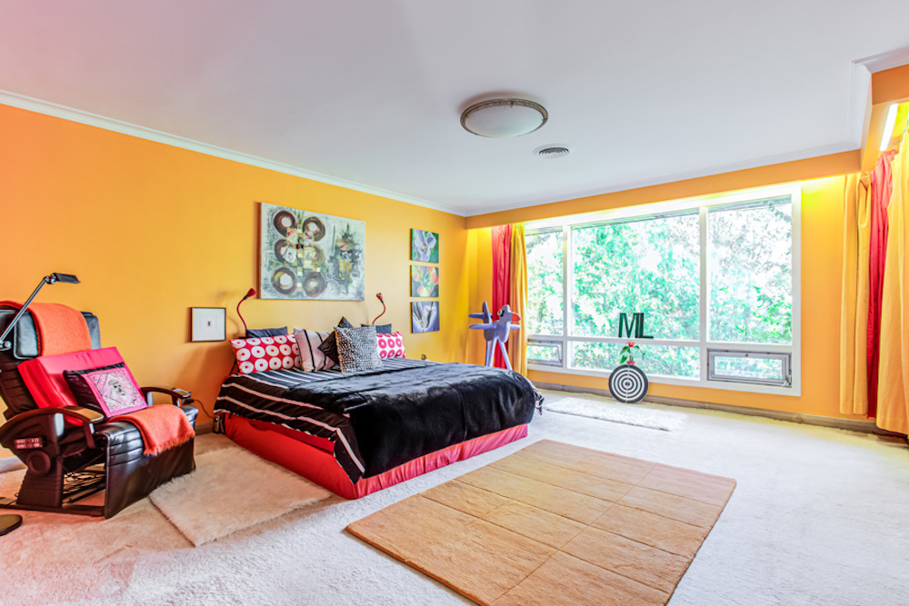Colourful bedroom in mid-century modern home