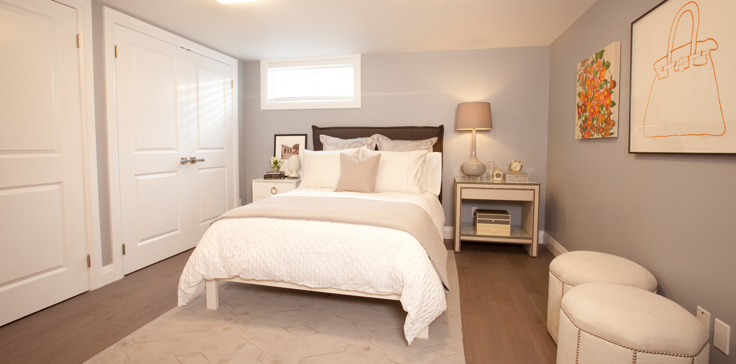 Basement bedroom in soft grey walls