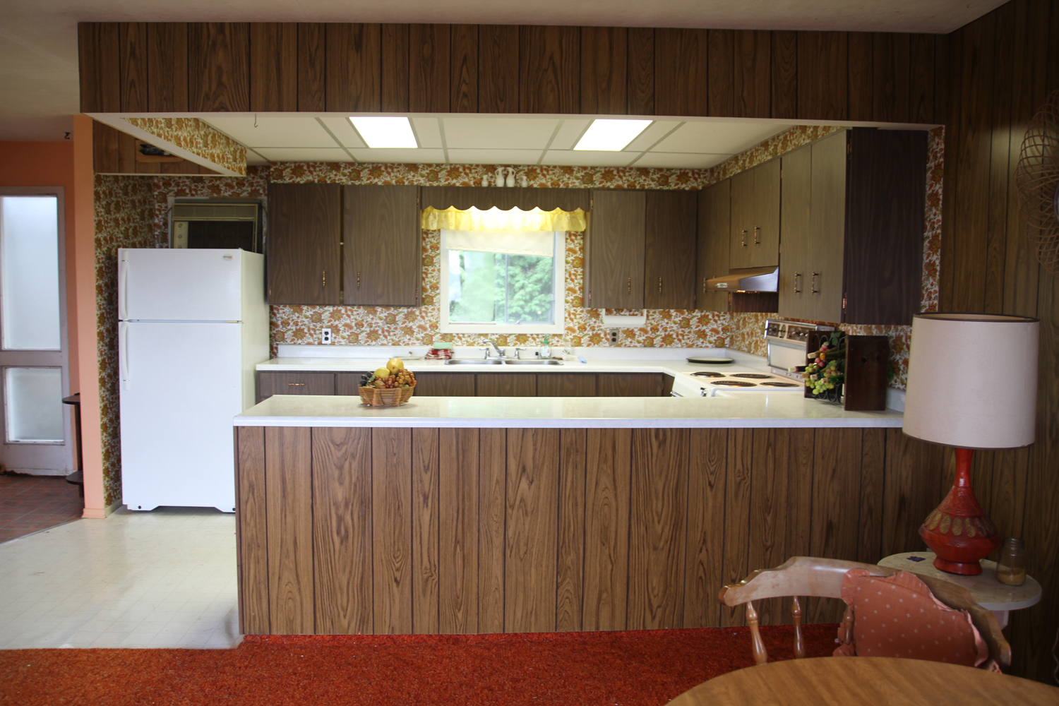 Retro kitchen with wallpaper backsplash