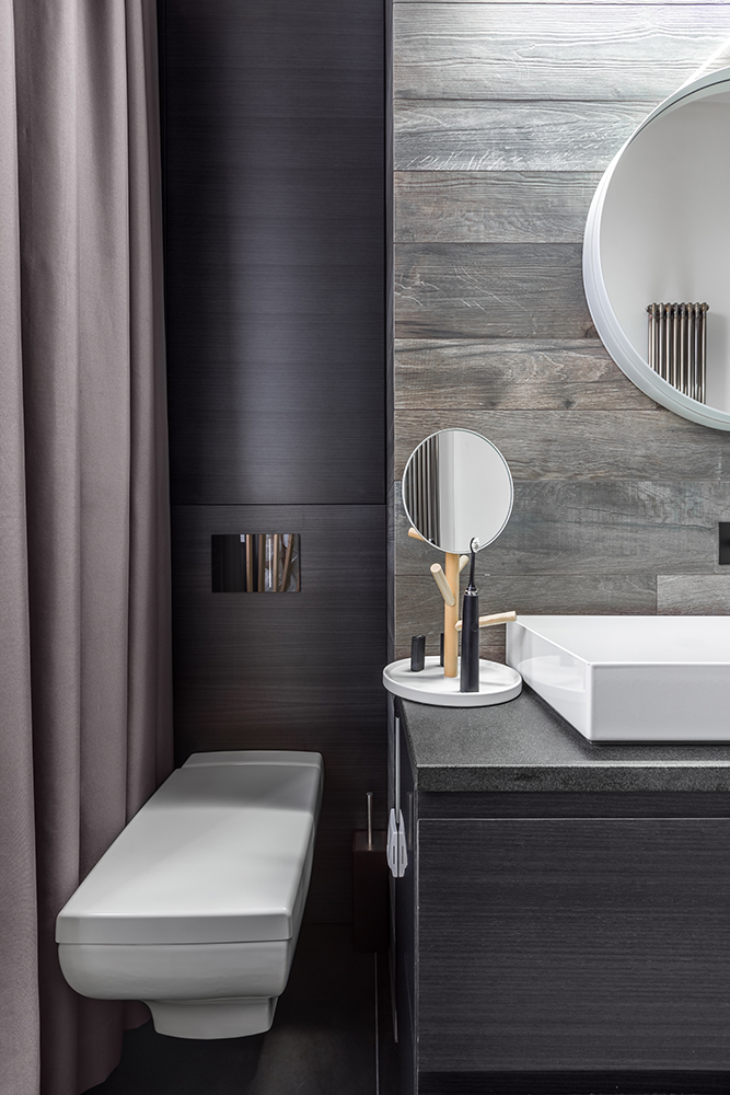 Modern bathroom with wall mounted toilet