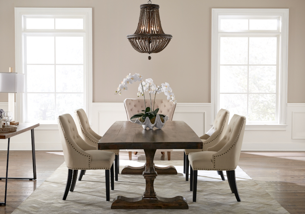 A dining room painted in a neutral tone