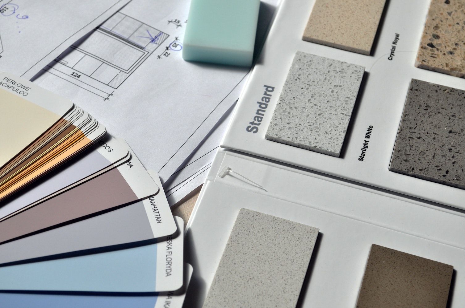 paint swatches, tile samples and floor plans