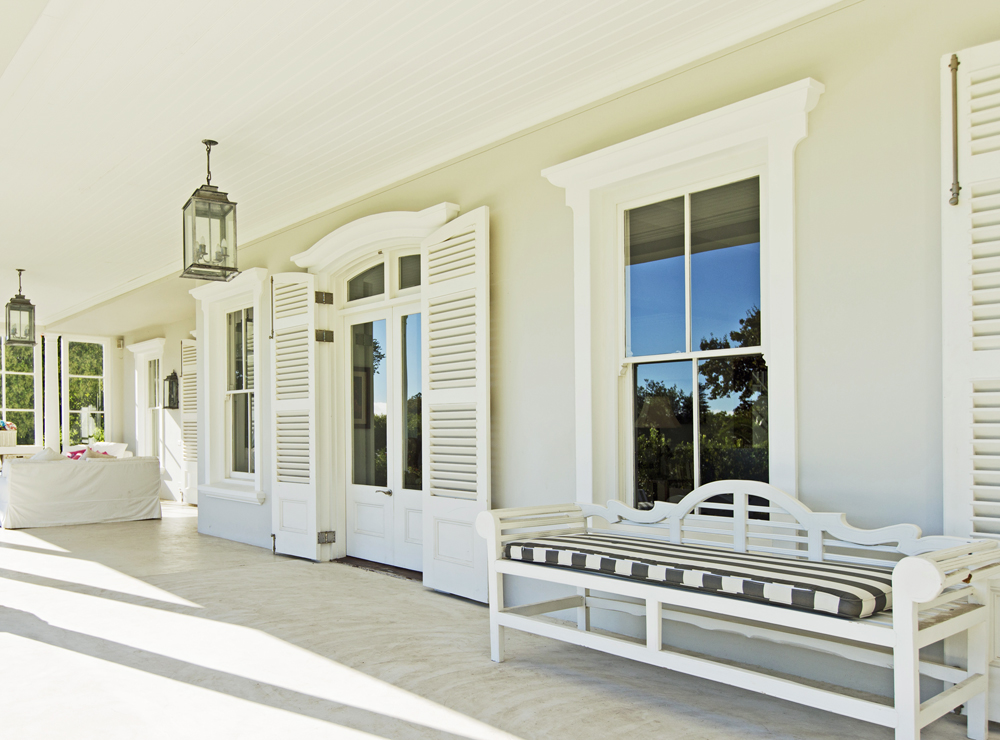 Modern and Spacious Front Porch With Chandelier Lighting
