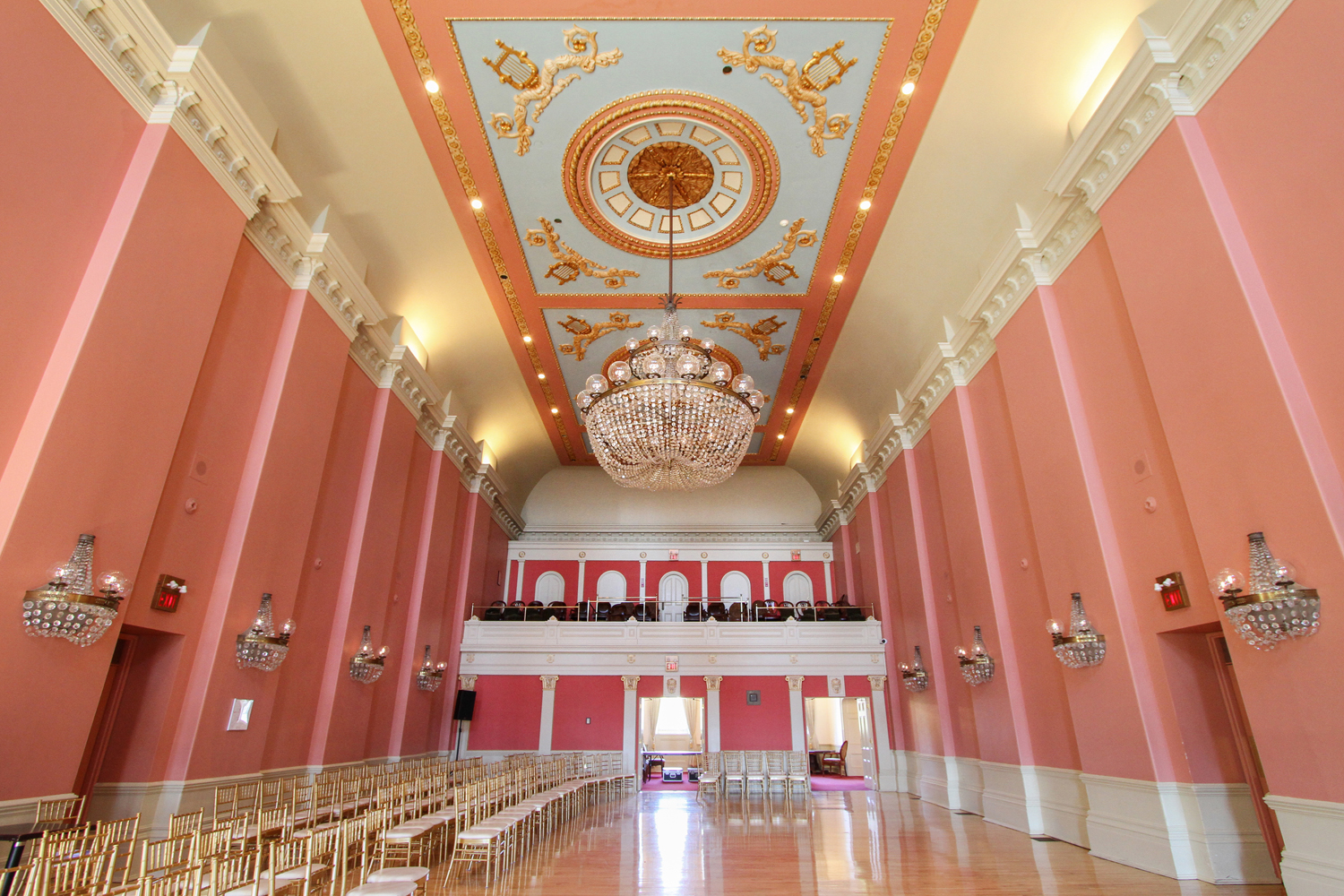 St. Lawrence Hall with pink walls and crystal chandelier