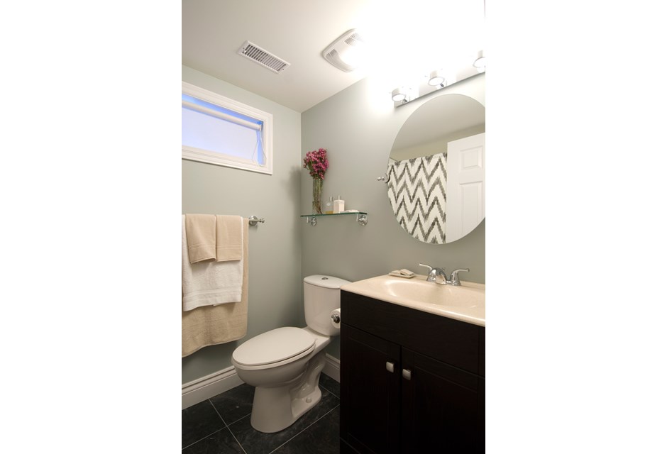 Updated bathroom with chevron shower curtains