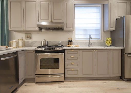 Beautiful grey kitchen with modern appliances
