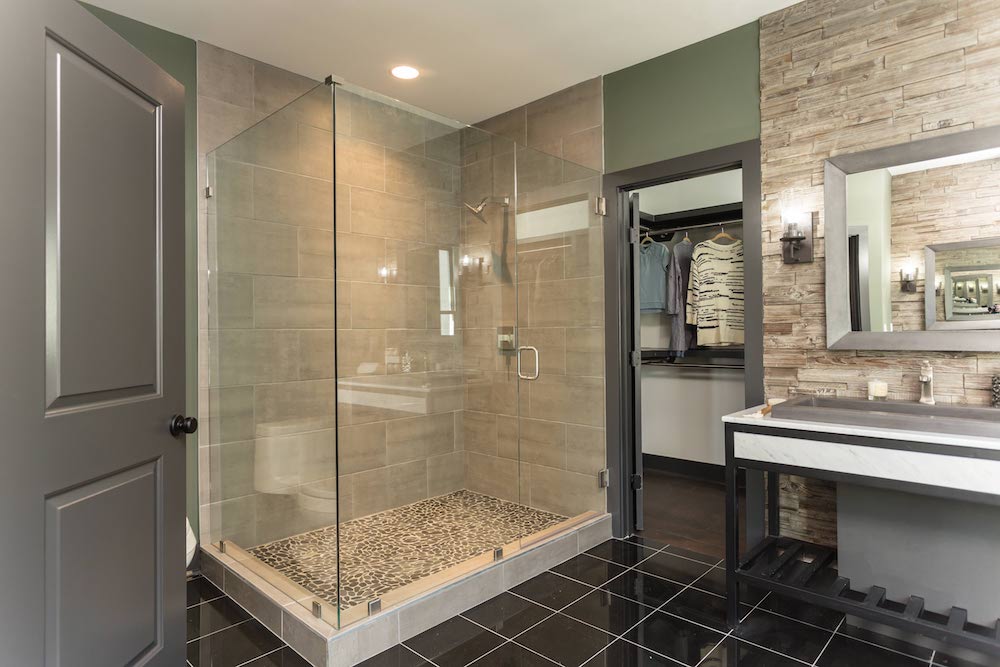Masters of Flip luxe lodge master bedroom ensuite with walk-in shower and black square tiles