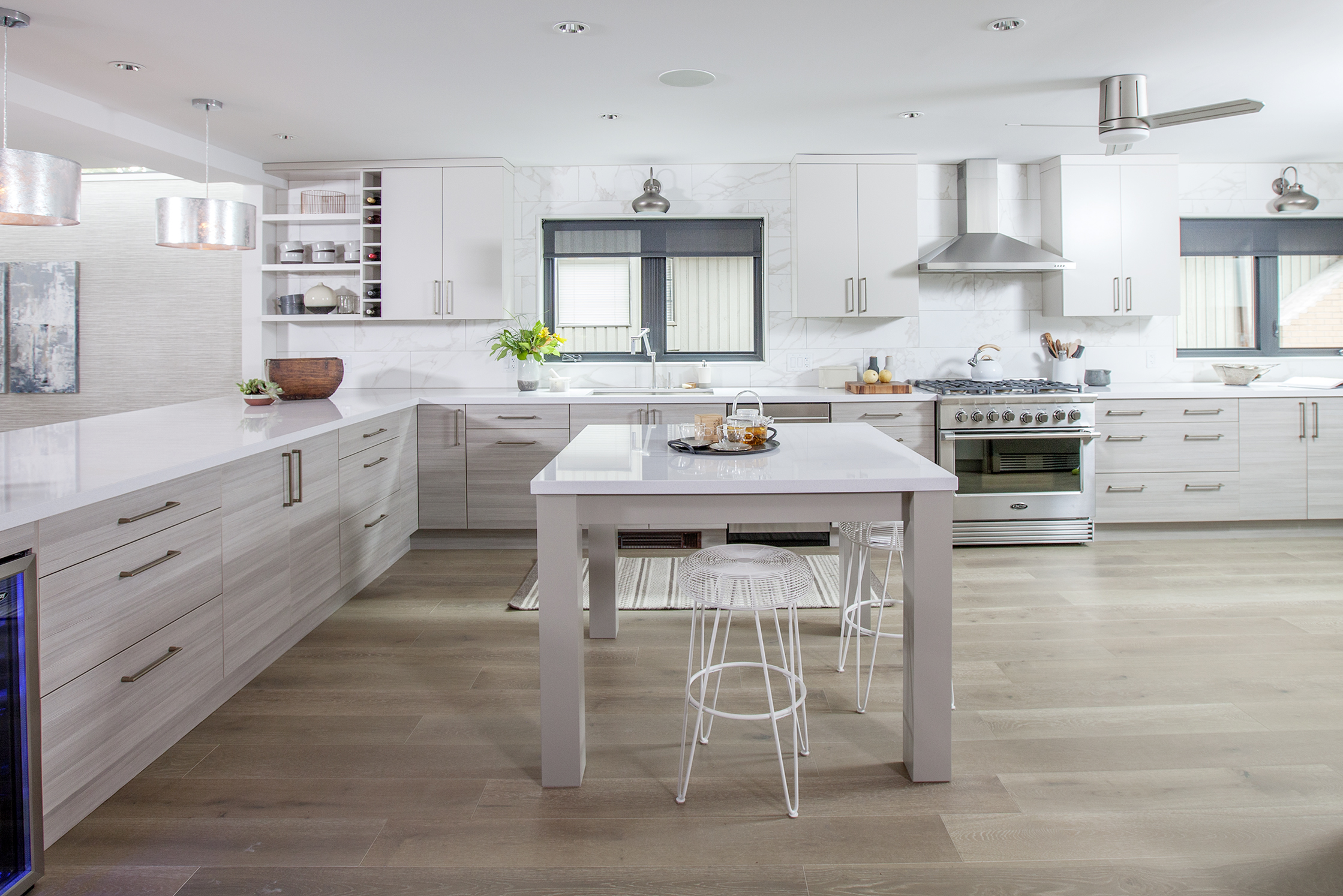 Modern white kitchen with sleek steel accents