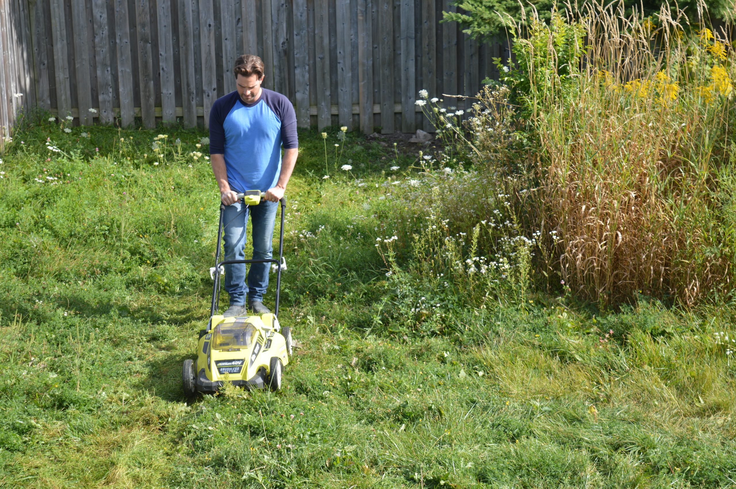 Scott McGillivray mowing the lawn