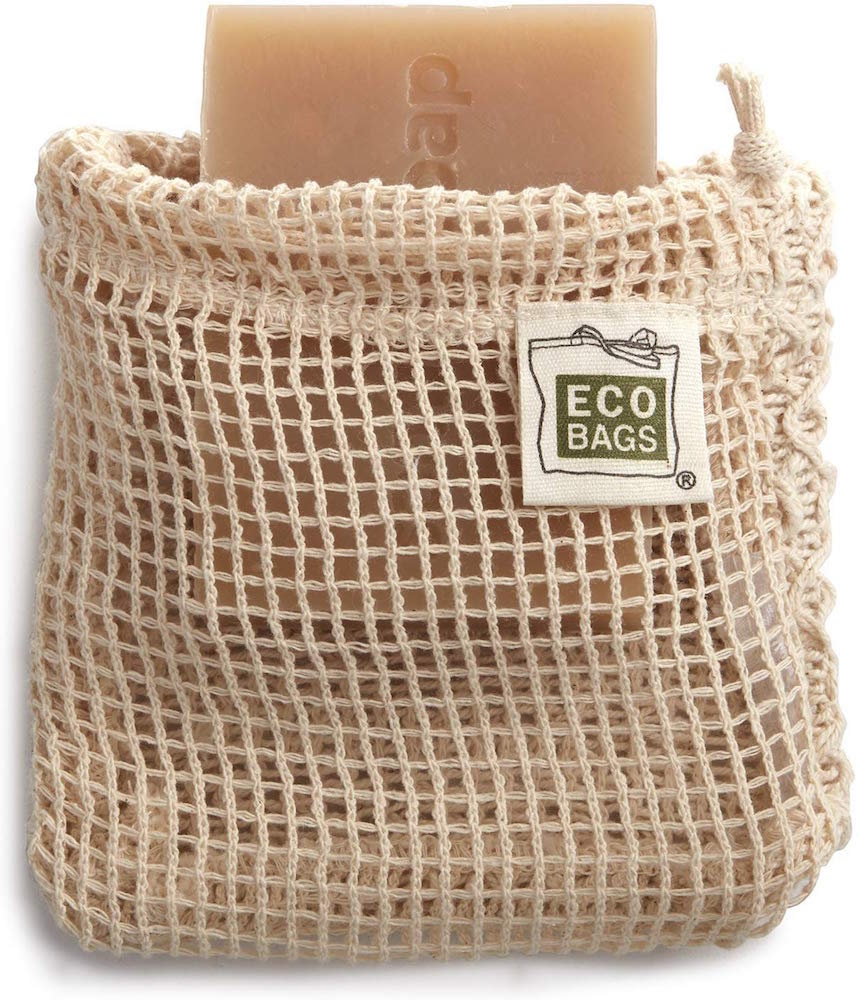 beige mesh bag with bar of soap at top