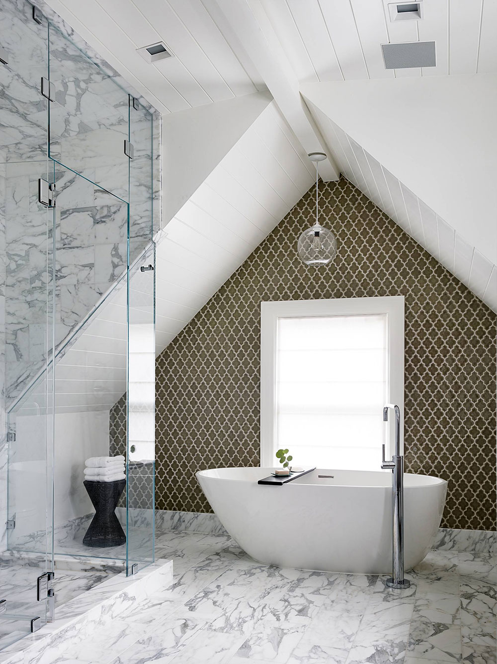 Luxurious attic bathroom with two types of tiles