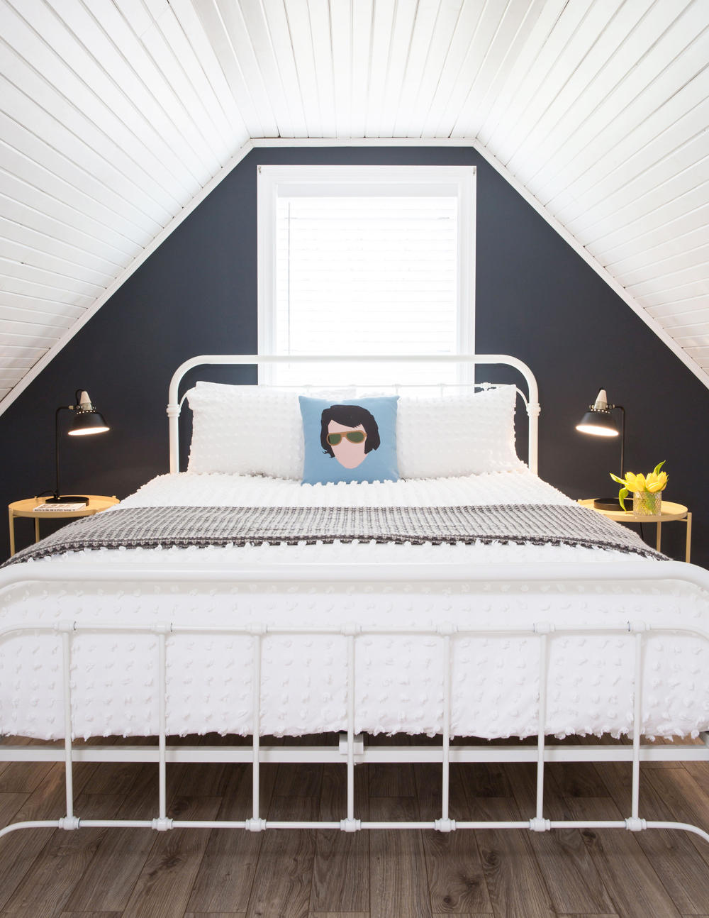 Cozy attic bedroom with shiplap ceiling