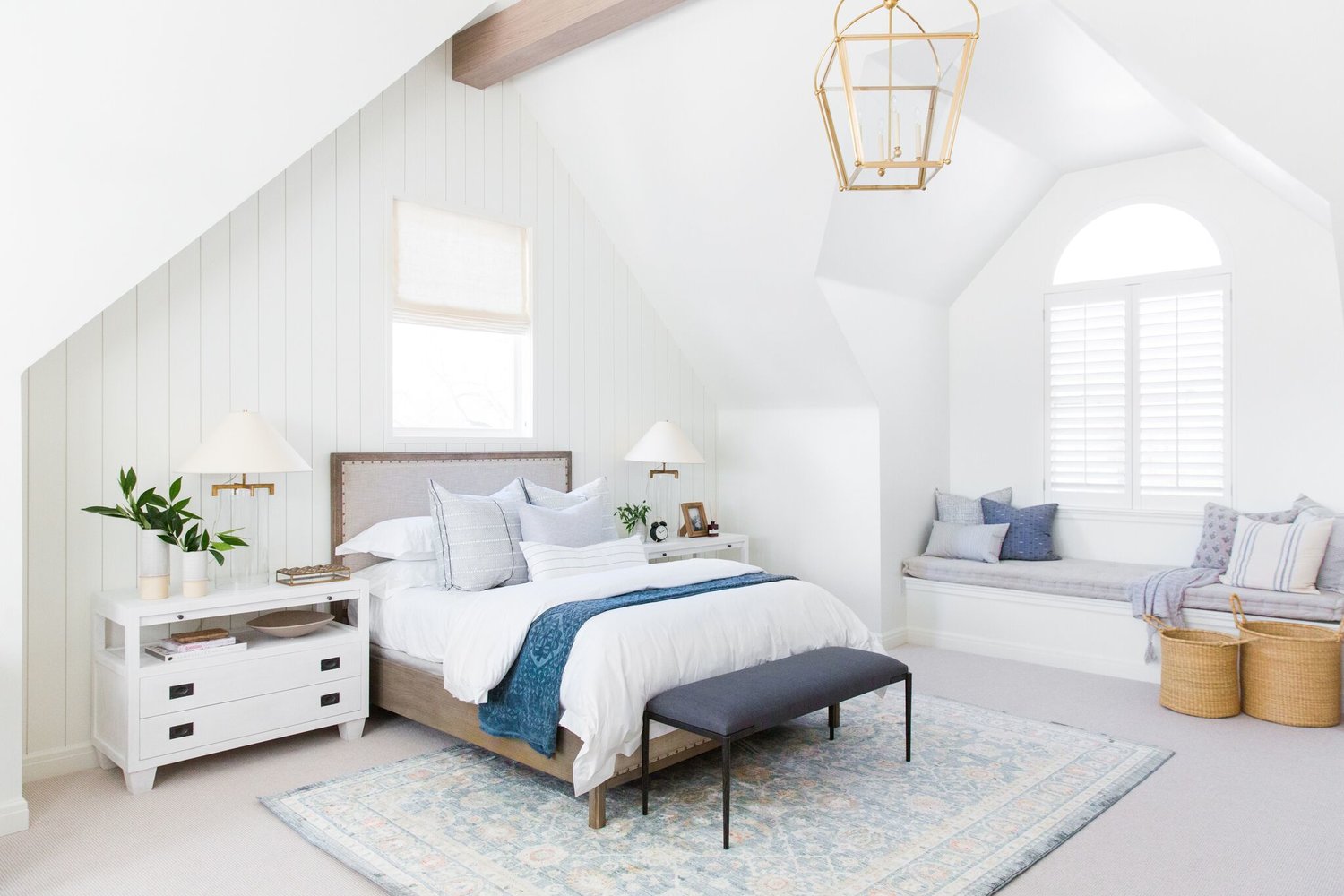 Bedroom sanctuary in attic with window seating