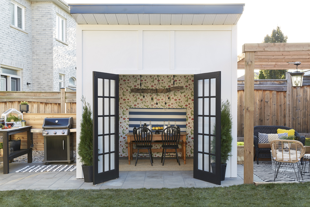 A backyard storage space that also acts as an outdoor dining area