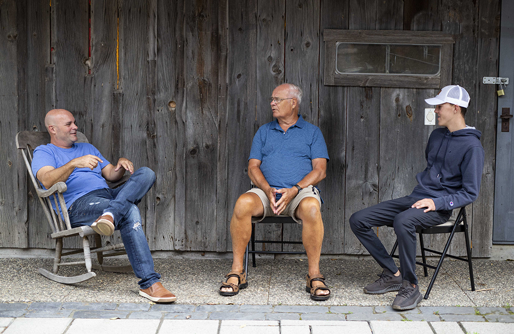 Bryan Baeumler with his father and son