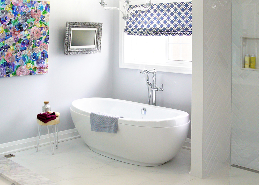 Bathroom with soaker tub, artwork and decorative blinds