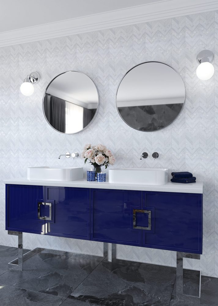 A shiny blue vanity in a beautiful modern bathroom
