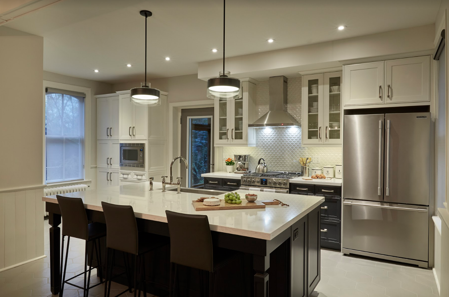 Kitchen with stainless steel appliances and large kitchen island