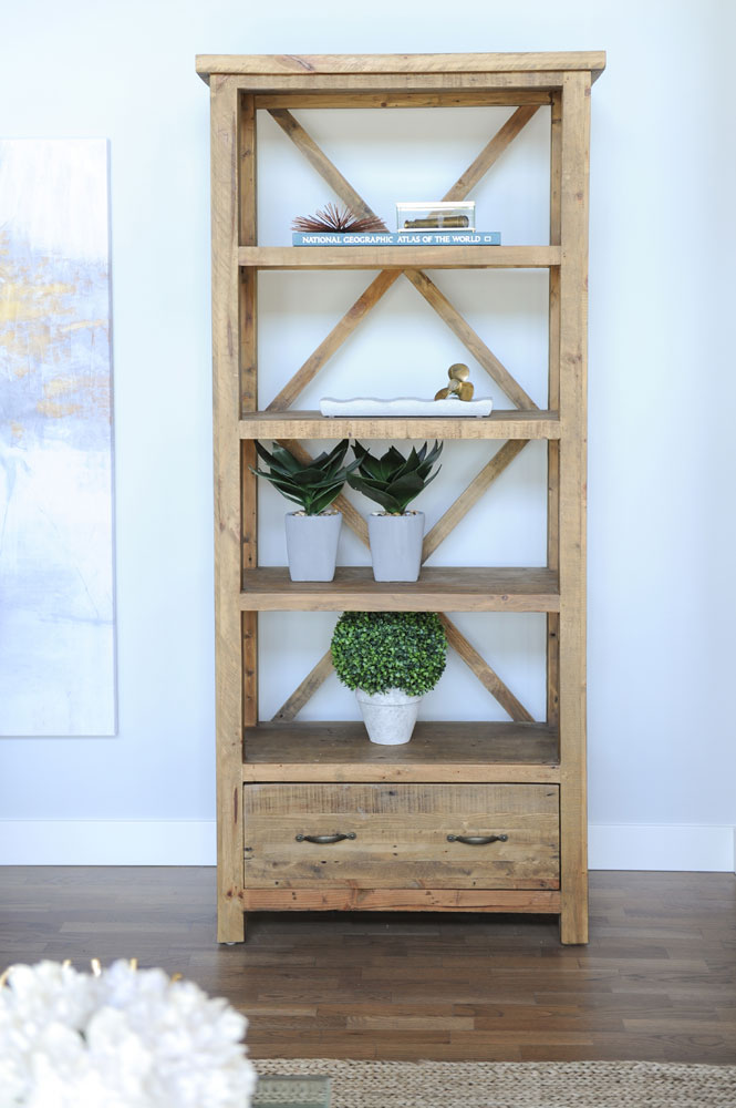 wood shelving unit with drawer at bottom and criss cross back