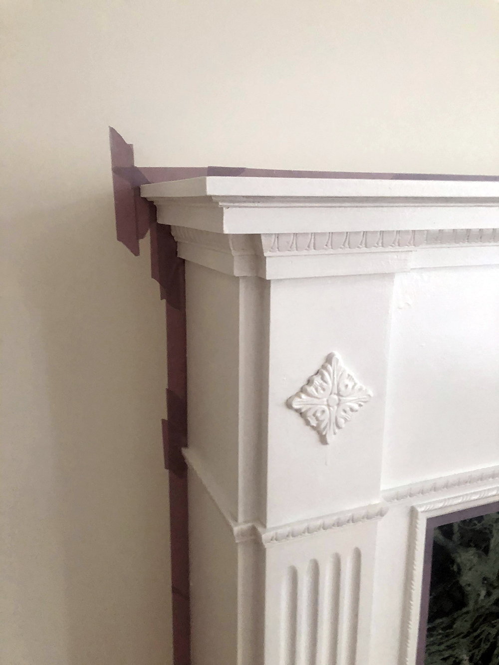 Painter's tape applied to fireplace