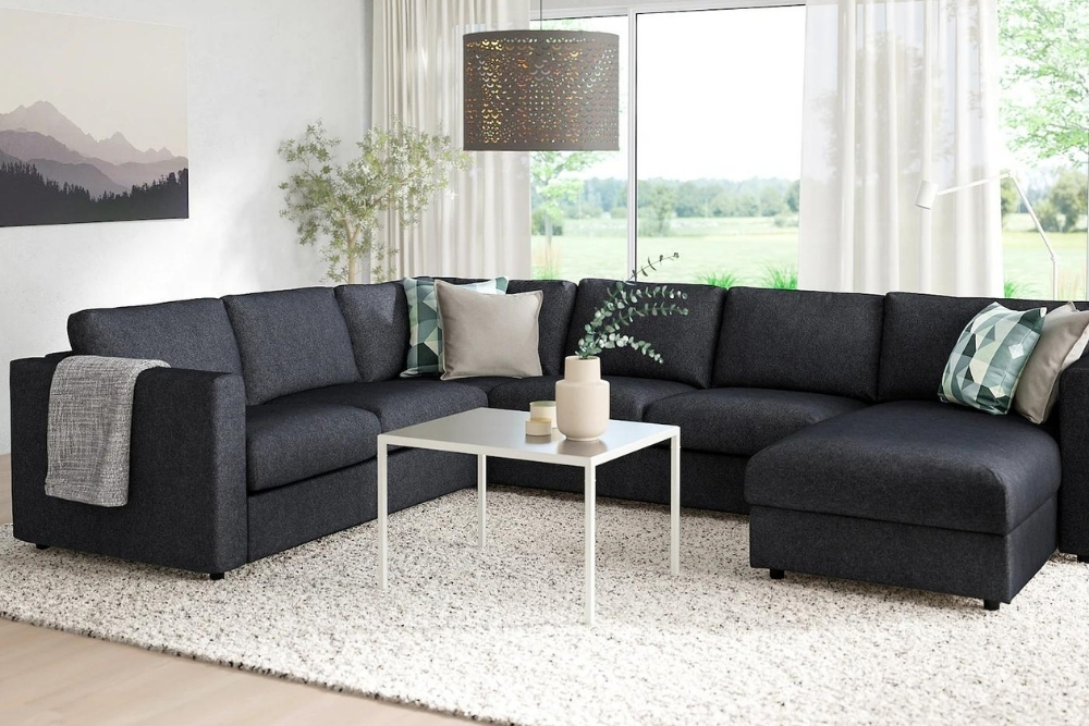 A six seater large grey sectional sofa.