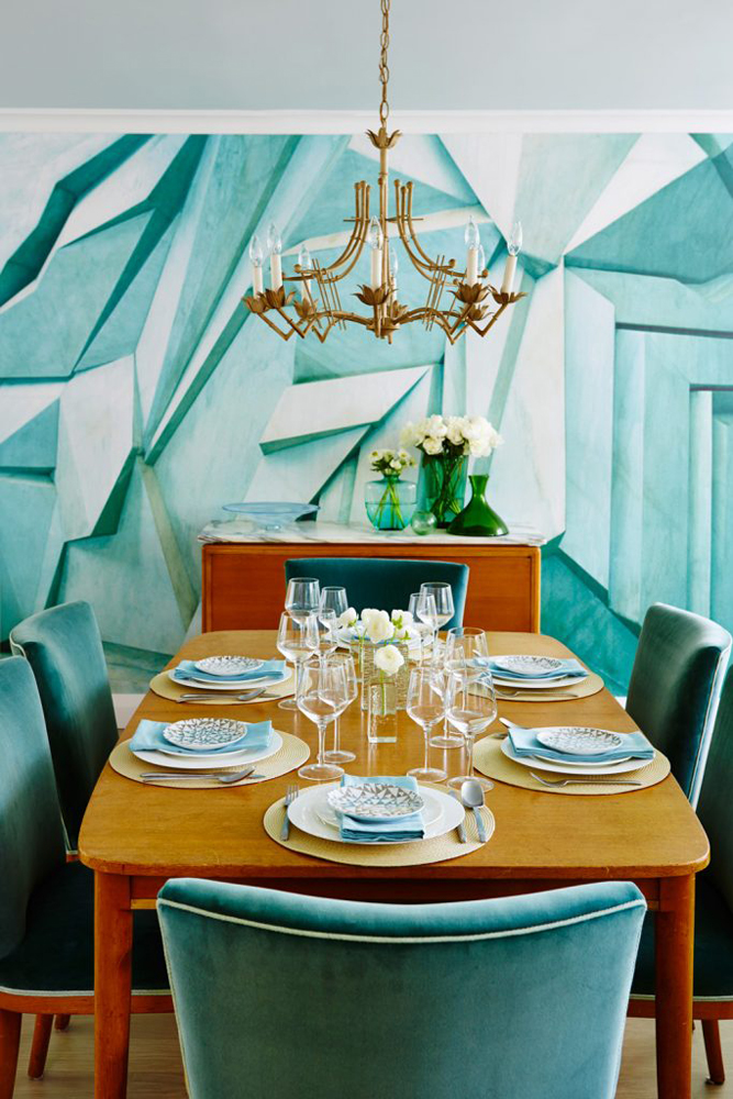 Teal abstract wallpaper in dining room