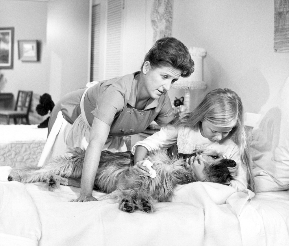 Brady Bunch star Ann B. Davis with child star Eve Plumb in a scene from The Brady Bunch