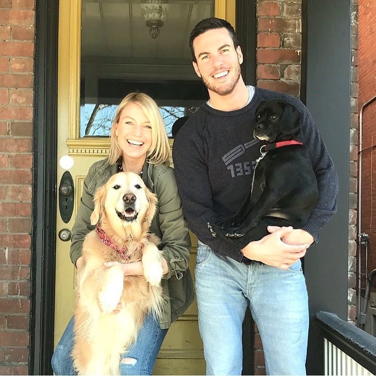 Brian McCourt and Sarah Keenleyside pose with their dogs.