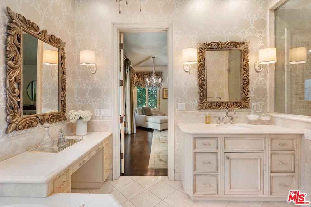 Master bathroom with filigreed mirrors