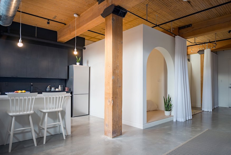 Kitchen and adjacent sleeping nook in Broadview Loft from StudioAC