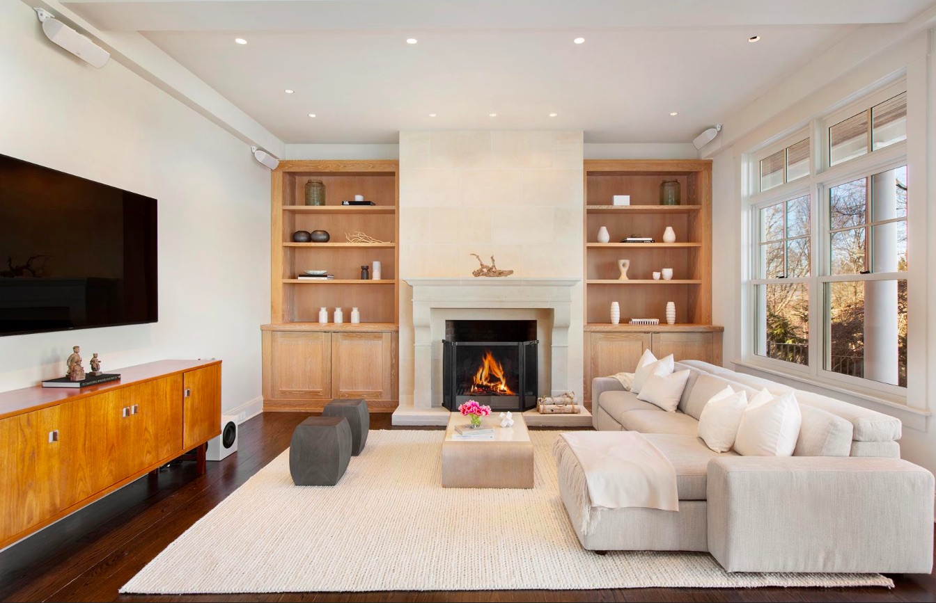 A wood-burning fireplace in the living room