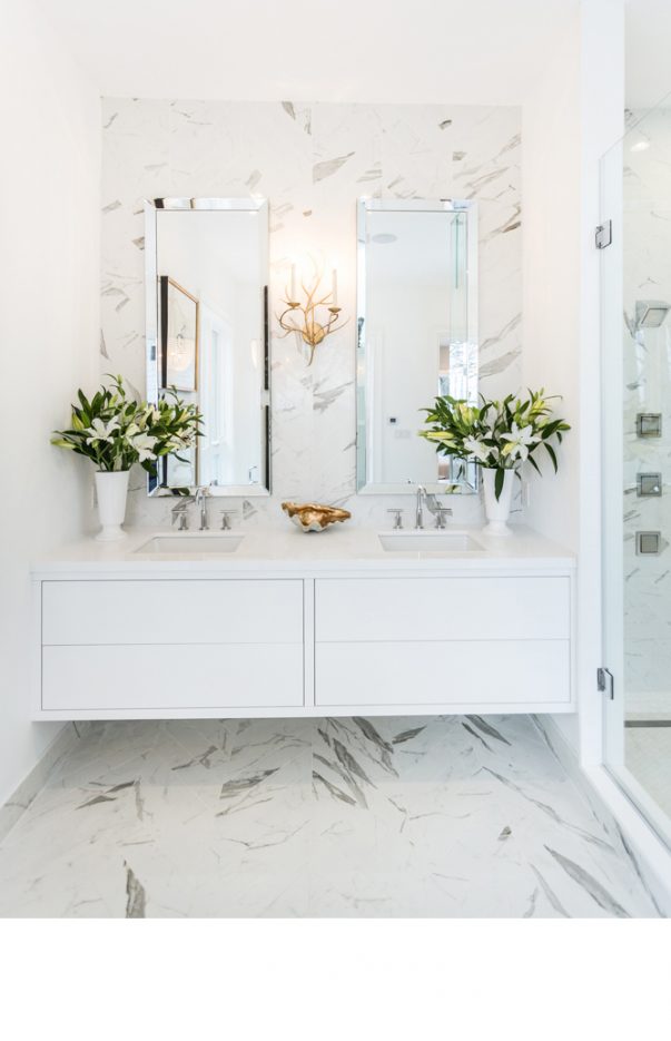Beautiful marble bathroom designed by Bryan and Sarah Baeumler.