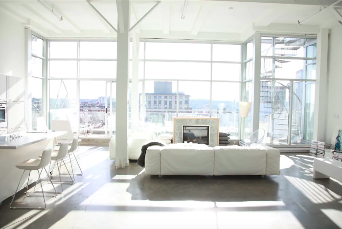 Loft penthouse with all-white furniture