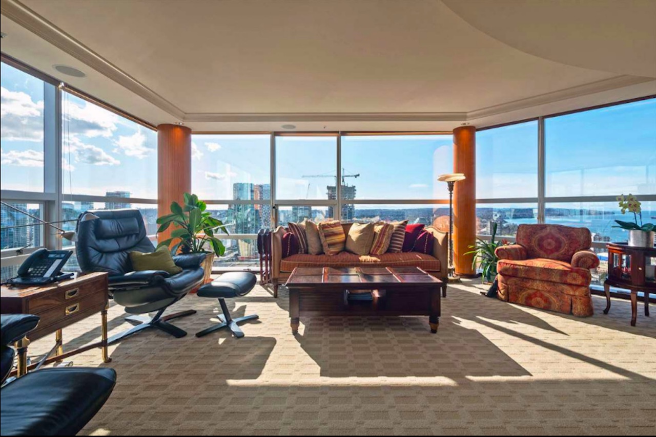 living room with patterned carpet and views